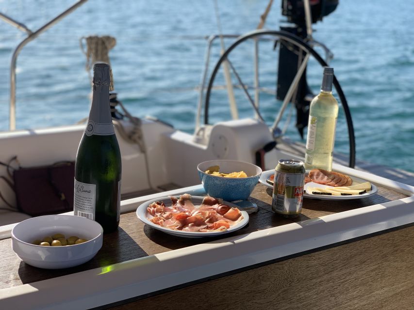 Barcelona: Midday or Sunset Sailing with Open Bar and Snacks - Why the crew matters on this particular boat trip