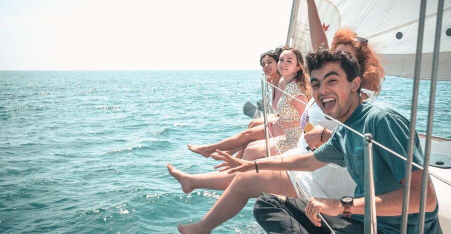 Barcelona: Midday or Sunset Sailing with Open Bar and Snacks - From harbor yachts to open Mediterranean water