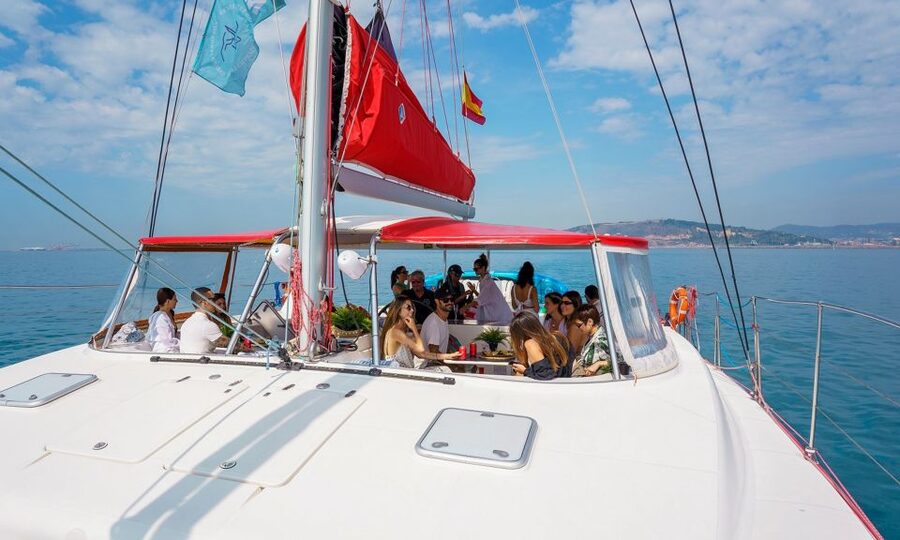 Barcelona: Sunset or Day Catamaran Cruise with Tapa & Drink - The tapa, drink, and onboard bar