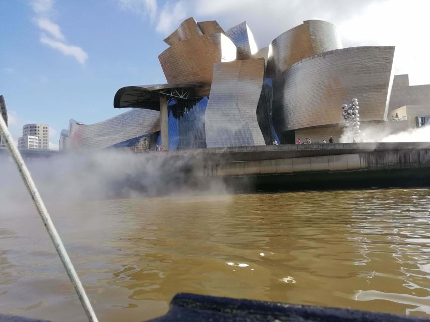 Bilbao: Bilbao Estuary and Abra Bay Boat Tour - Leaving the city beside the Guggenheim and Deusto Canal