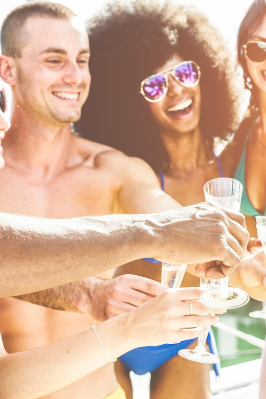 Boat Party to the Beach with Swimming Stops, DJ and Open Bar - The swim stop near the river beach