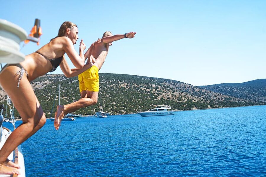 Boat Party to the Beach with Swimming Stops, DJ and Open Bar - How the party atmosphere feels