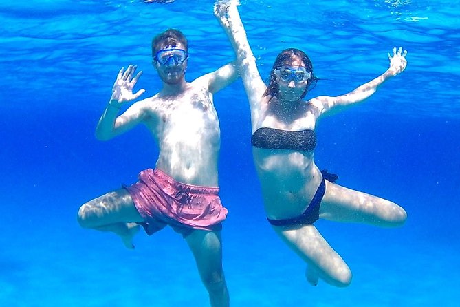 Boat Tour Egadi Day discover Favignana and Levanzo from Trapani - Cala Rossa brings the famous scenery
