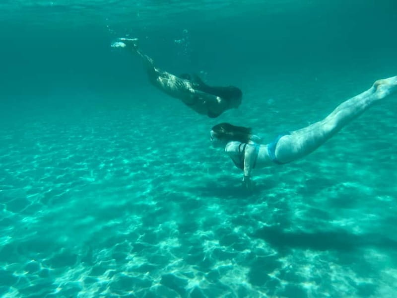 Cagliari: Boat Tour with 4 Swim Stops, Snorkeling & Prosecco - Marina Piccola and Poetto: possible final stops
