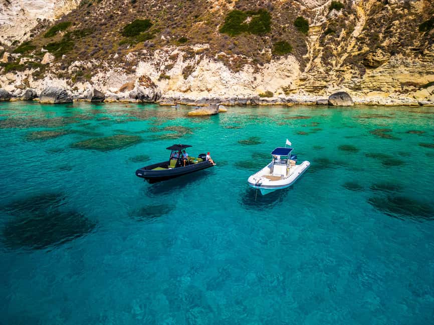 Cagliari: Boat Tour with 5 Snorkeling Stops & Free Drinks - Sella del Diavolo: cliffs, stories, and another long swim