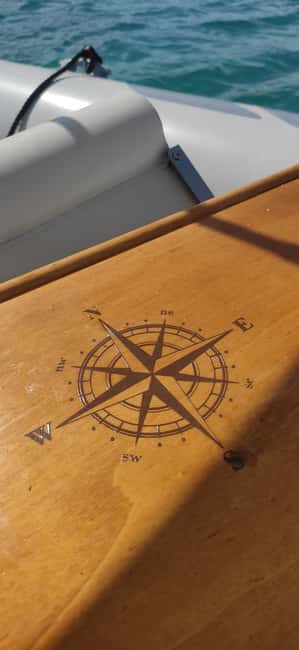 Cagliari: Sella del Diavolo Boat Magic Tour Drinks & Snacks - The aperitif: Sardinia served on a small boat