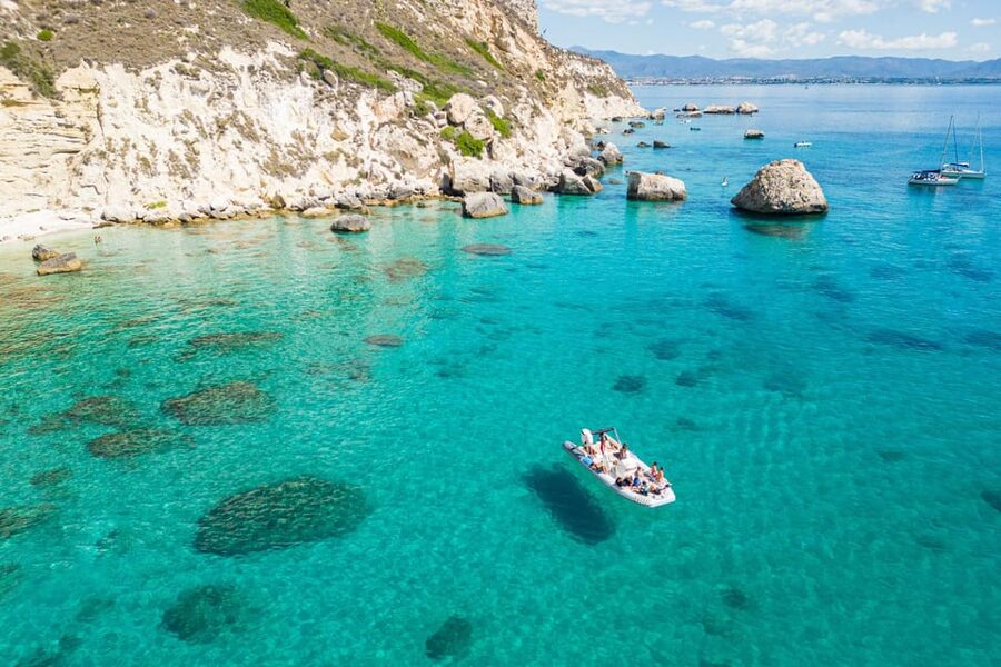 Cagliari: Zodiac Boat Tour, 3-4 SwimStops, Wine & Snorkeling - Cala Fighera and the limestone coast