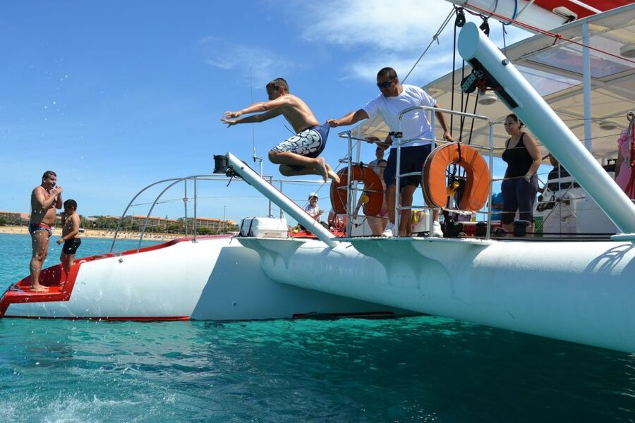 Caleta de Fuste: Catamaran Sailing Experience - Paella, Canarian potatoes, and the open bar