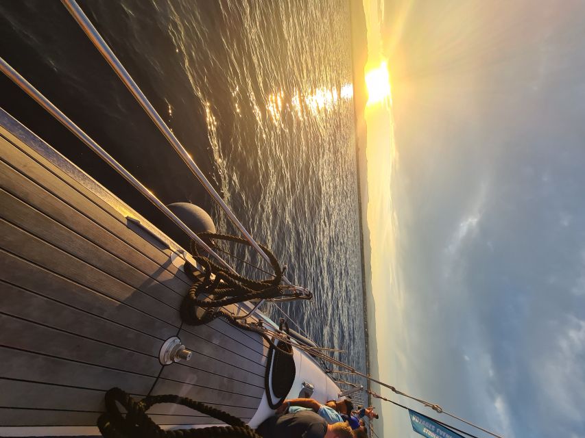 Cambrils: Costa Dorada Sunset Catamaran Cruise with Drinks - Sunset from the water, with weather as part of the deal