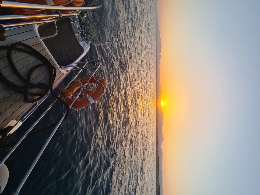 Cambrils: Costa Dorada Sunset Catamaran Cruise with Drinks - Beaches, fishing villages, and the changing Costa Dorada light