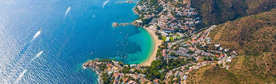 Cap Norfeu: Costa Brava Catamaran Trip with Underwater Views - Audio commentary and the onboard setup