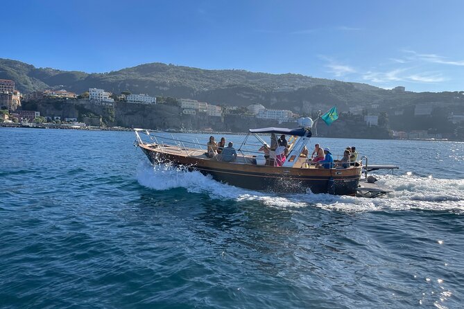 Capri Blue Grotto Small-Group Boat Day Tour From Sorrento - Capri’s western sights, from Green Grotto to Punta Carena