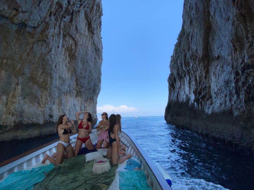 Capri: Island and Grottos Boat Cruise with Snacks and Drinks - The grottos: White, Green, and the cave experience