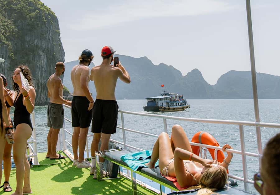 Cat Ba: Lan Ha & Ha Long Bay Kayak & Snorkel Boat Tour - Cruising Lan Ha Bay Toward the Limestone Caves