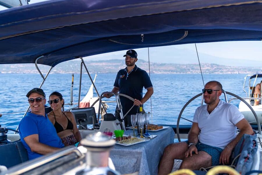 Catania: Cyclops Coast Cruise with Appetizer & Snorkeling - Lachea Island: swimming, snorkeling, and SUP