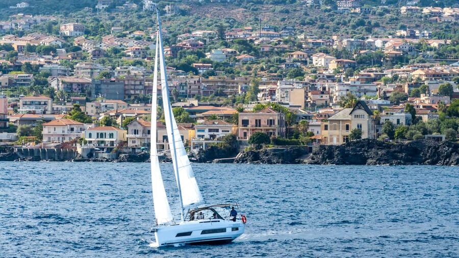 Catania: Sail Tour of Cyclops Coast with Sicilian Aperitif - Swimming and snorkeling by the Cyclopean Isles