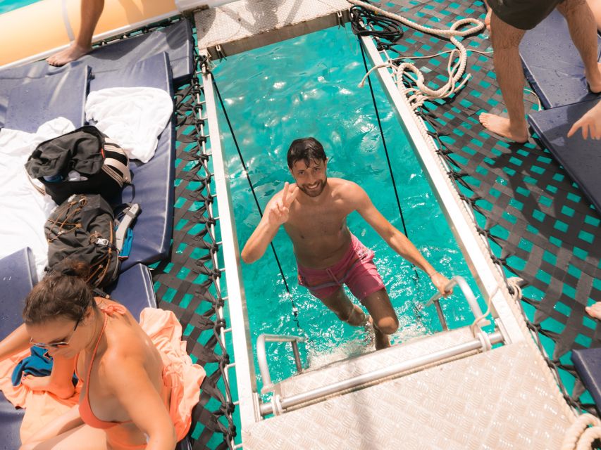 Comino: Blue Lagoon Catamaran Cruise with Lunch and Open Bar - Sailing toward Comino and the first swim
