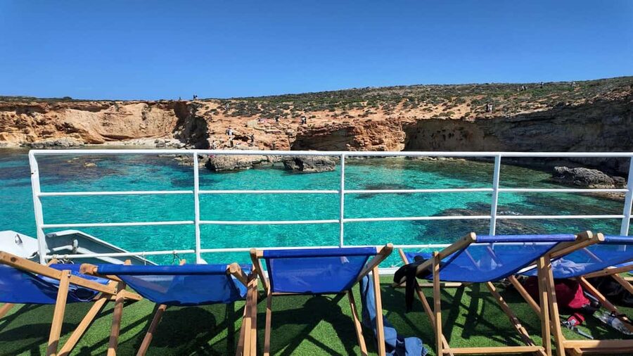 Comino: Blue Lagoon & Caves Boat Cruise - Food, drinks, and the pineapple cocktail