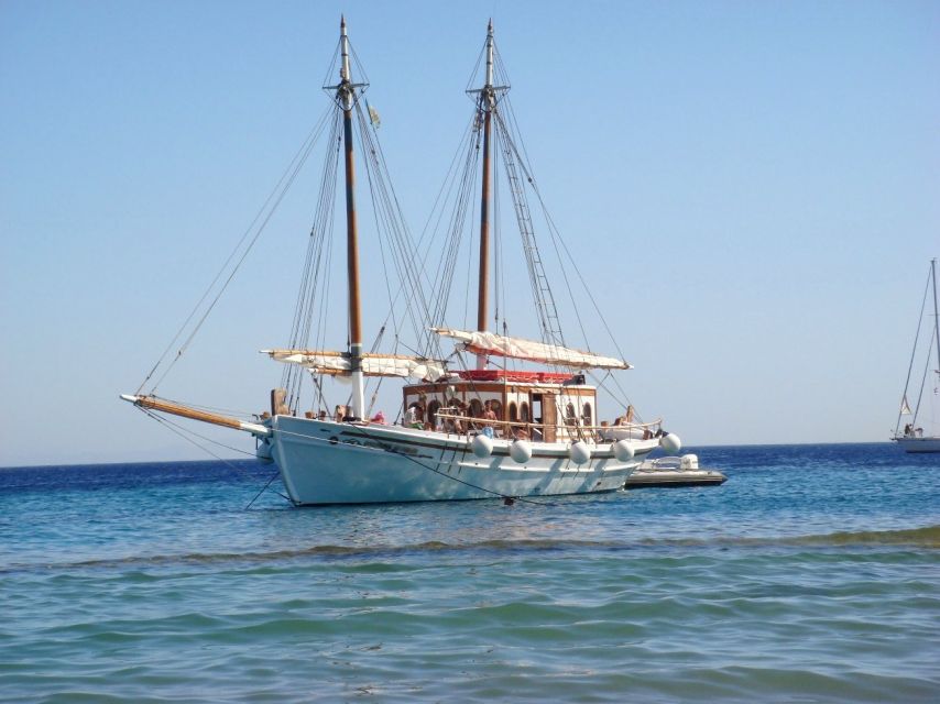Corfu Town: Full-Day Cruise with Lunch, Drinks & Swim Stops - Local lunch on the boat, with wine and plenty of food