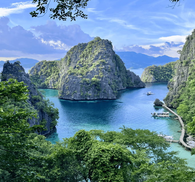 Coron: Private Boat Hire with Guided Tour and Lunch on Beach - Kayangan Lake and the island viewpoints