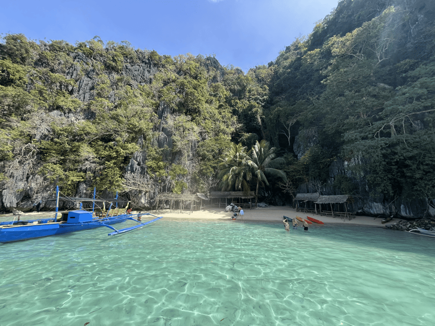 Coron: Private Boat Hire with Guided Tour and Lunch on Beach - Lunch prepared by the crew