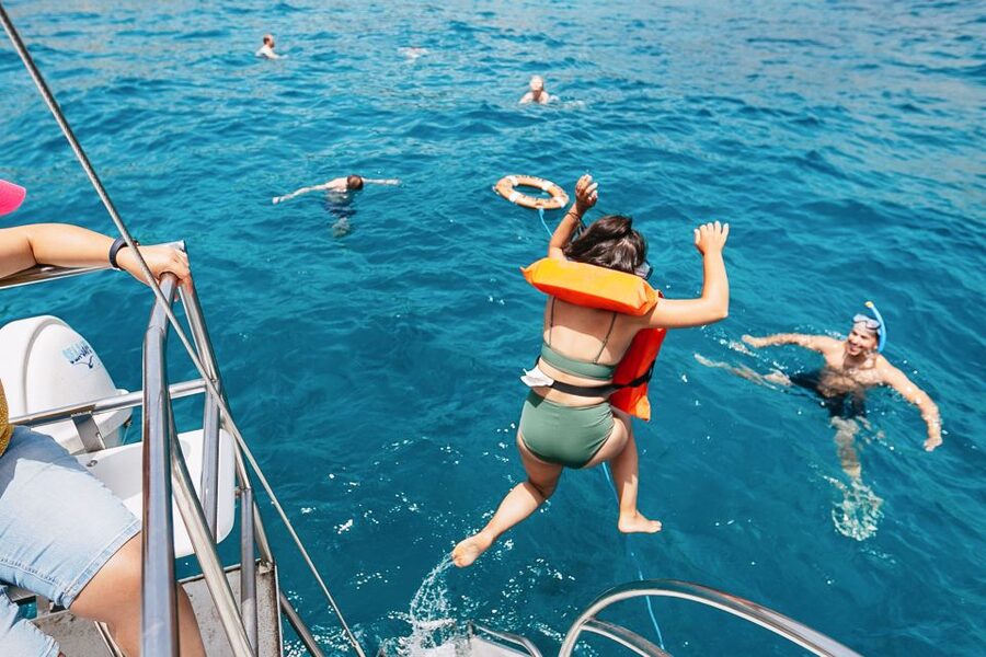 Costa Adeje: Whale Watching Catamaran Tour with Drinks - Dolphins, fish farms, and the chance of unusual sightings
