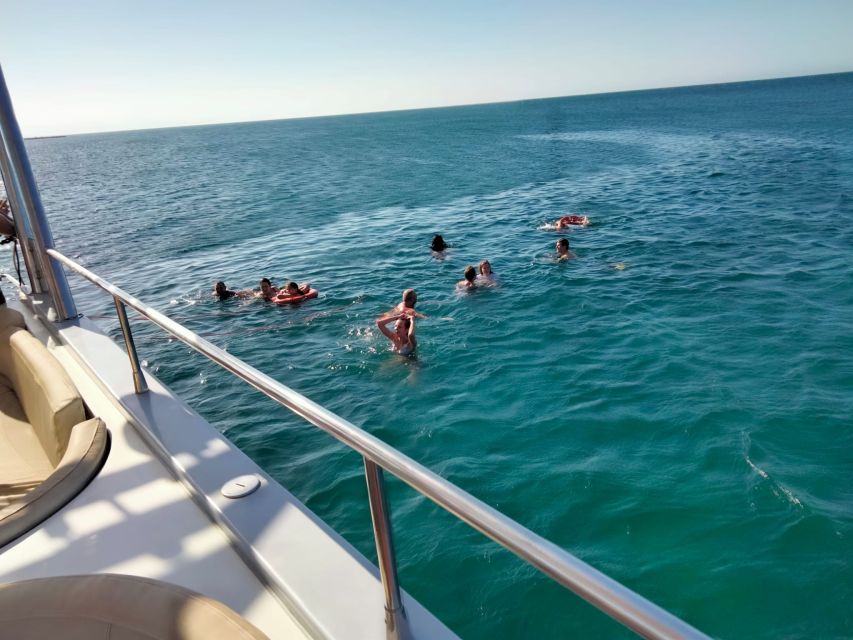 Denia: Cova Tallada Catamaran Tour and Swimming Stop - Music, drinks, and the relaxed middle of the trip