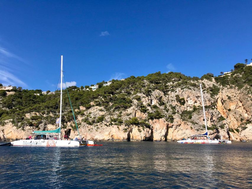 Dénia & Jávea: Portixol Sailing Catamaran Excursion with BBQ - Seating, sun, and the optional net upgrade