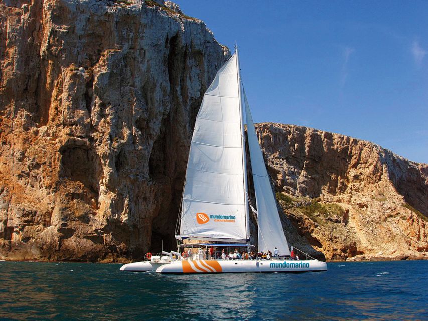 Dénia & Jávea: Portixol Sailing Catamaran Excursion with BBQ - Coastal views from the catamaran