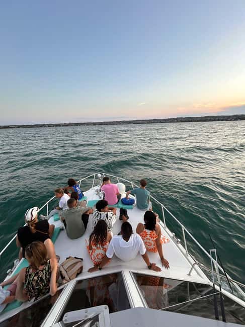 Desenzano del Garda: Sunset Boat Trip at Sunset with Drink - Booking, cancellation, and weather planning