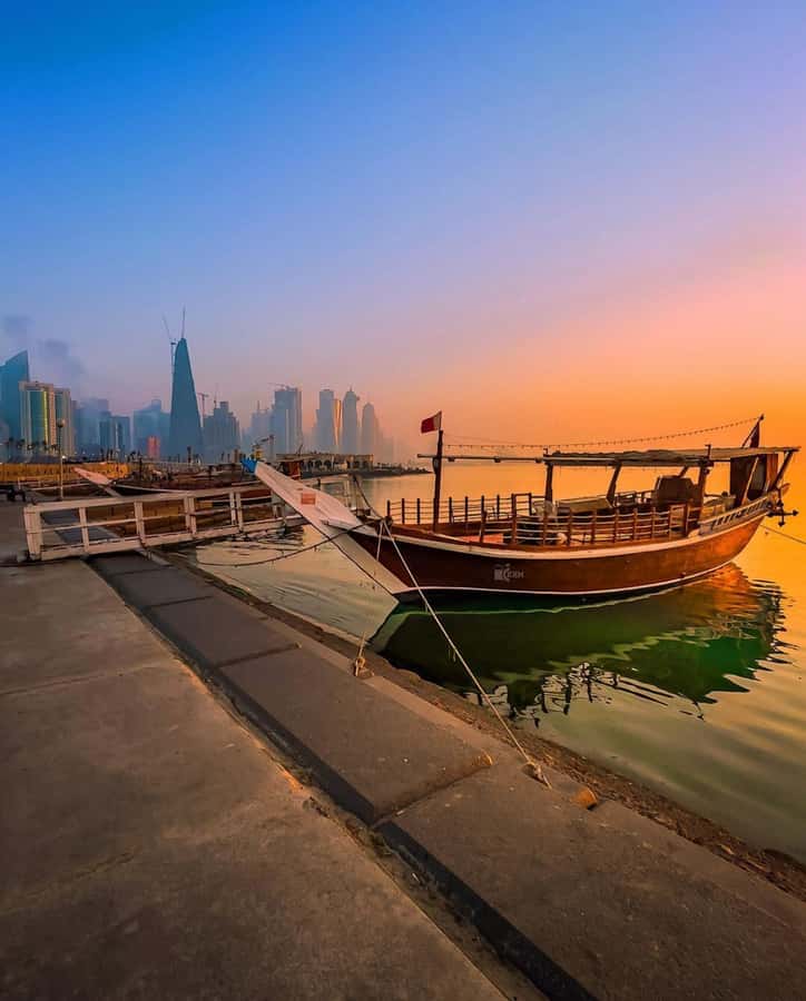 Doha: Sunset Serenade Skyline Dhow Cruise with Buffet Dinner - A traditional dhow with two ways to sit