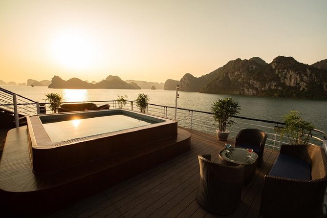 Doris Cruise 5 star cruise 2 days visiting Halong Bay Lan Ha Bay private balcony - Dark and Bright Cave by tender