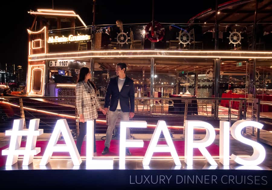 Dubai: Luxury Canal Dinner Cruise with Optional Transfers - A glass-enclosed dhow with a front-row view of Dubai at night