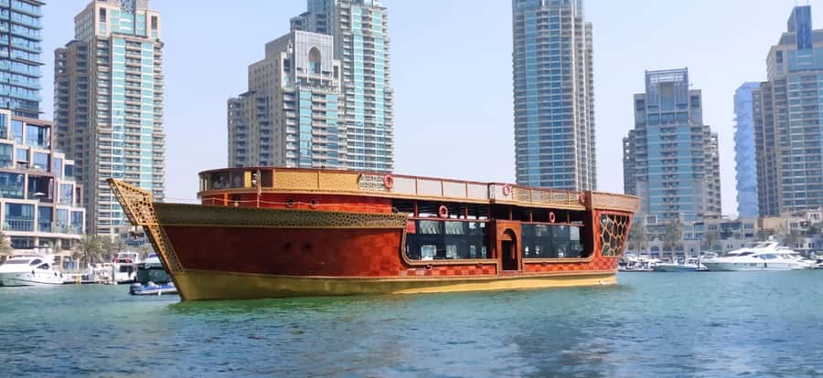 Dubai Marina: Dinner Cruise in a Traditional Boat - Boarding the Ocean Empress at Dubai Marina