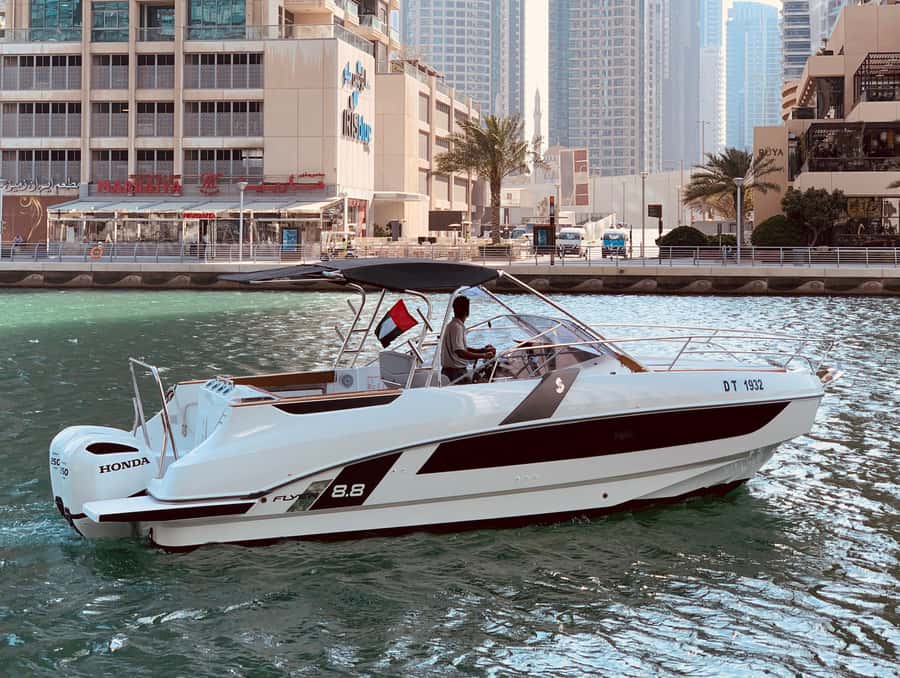 Dubai: Private Sea Escape Cruise - Swim, Tan & Sightsee - A private boat with your own soundtrack