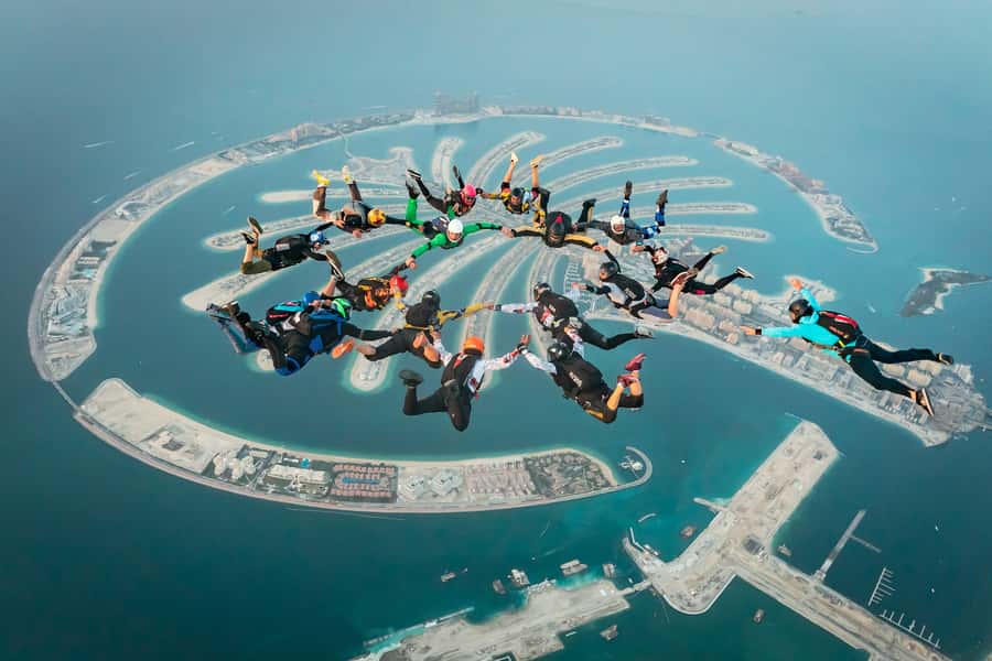 Dubai: Skydive at The Palm with Photos, Video & Yacht Tour - Four to five minutes beneath the parachute