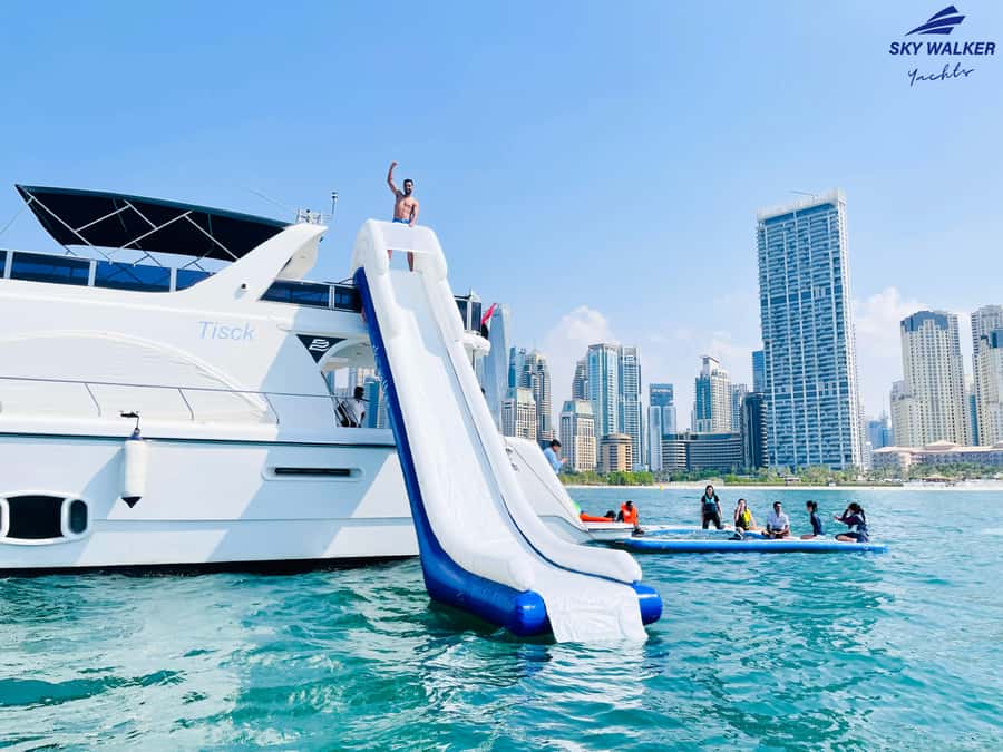 Dubai: Yacht Cruise with Swimming, Snorkeling and BBQ Lunch - Dubai Marina views before the swimming stop