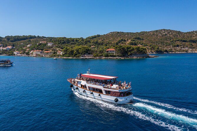 Dubrovnik: Elaphiti Islands Full-Day Cruise with Lunch - Koločep: pine forests, clear water, and a short first stop