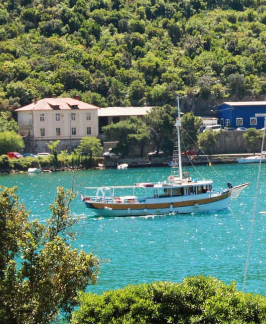 Dubrovnik: Full-Day Blue Cave & Elaphiti Islands Boat Tour - Koločep: pine trees, coves, and Donje Čelo