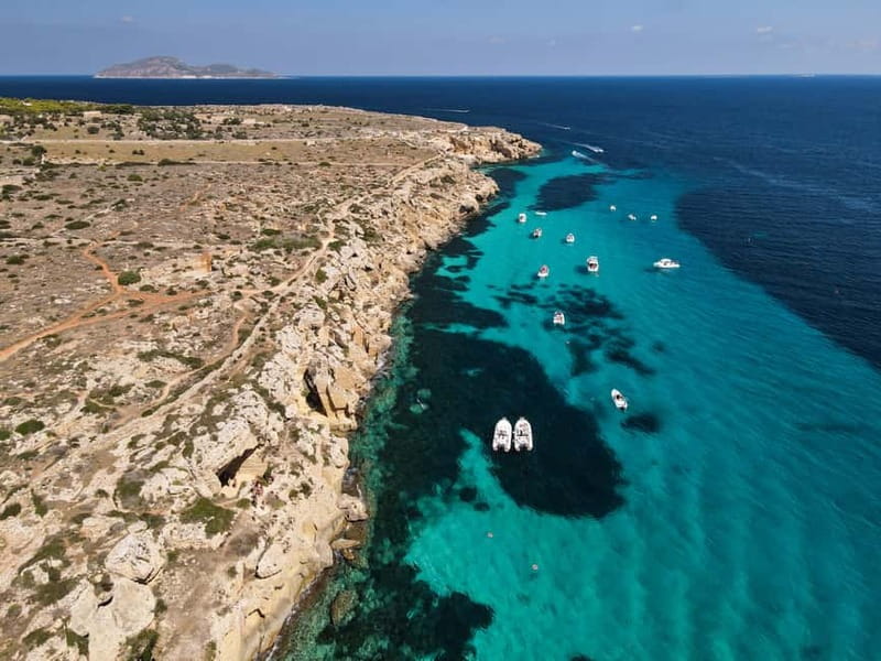 Egadi Boat Experience: Favignana & Levanzo from Trapani - Drinks, snacks, music, and the boat atmosphere