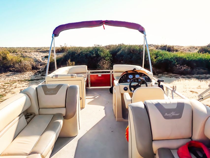 Faro: Ria Formosa Faro Islands Boat Tour - Leaving Faro through the park channels