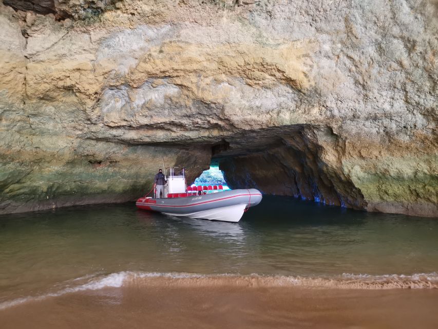 From Albufeira: Benagil Caves and Dolphins Guided Boat Tour - Entering caves and passing secret beaches