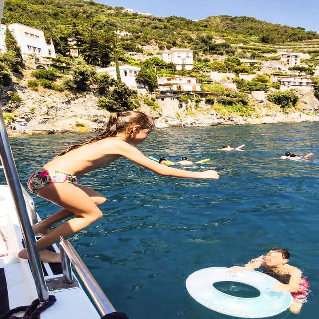 From Amalfi: Coast & Furore Fjord Boat Tour with Swim Break - Boarding at the Amalfi ferry pier