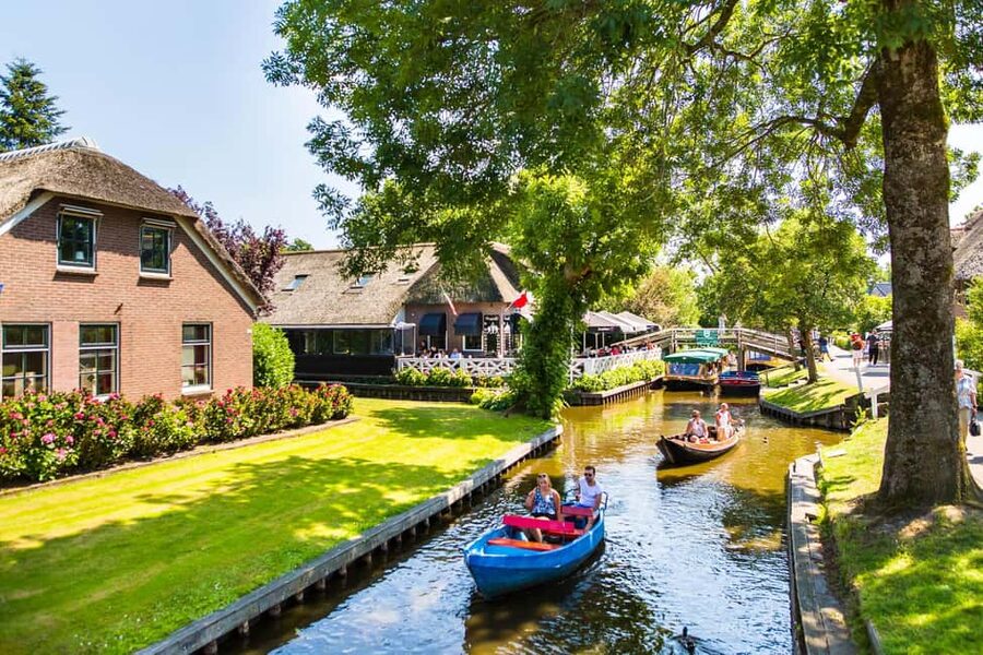 From Amsterdam: Ultimate Giethoorn Experience with Boat Tour - What $74 includes and what it does not