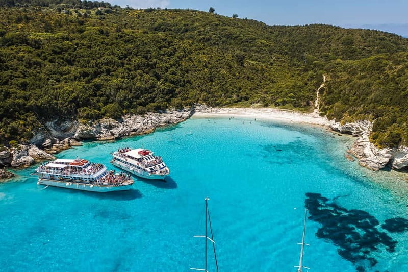 From Corfu: Day Cruise to Paxos, Antipaxos, & the Blue Caves - Entering the Blue Caves near Paxos