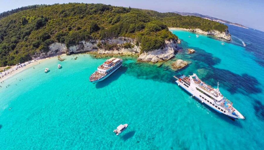 From Corfu Island: Antipaxos & Paxos Blue Caves Boat Cruise - The Blue Caves and the white cliffs of Erimitis