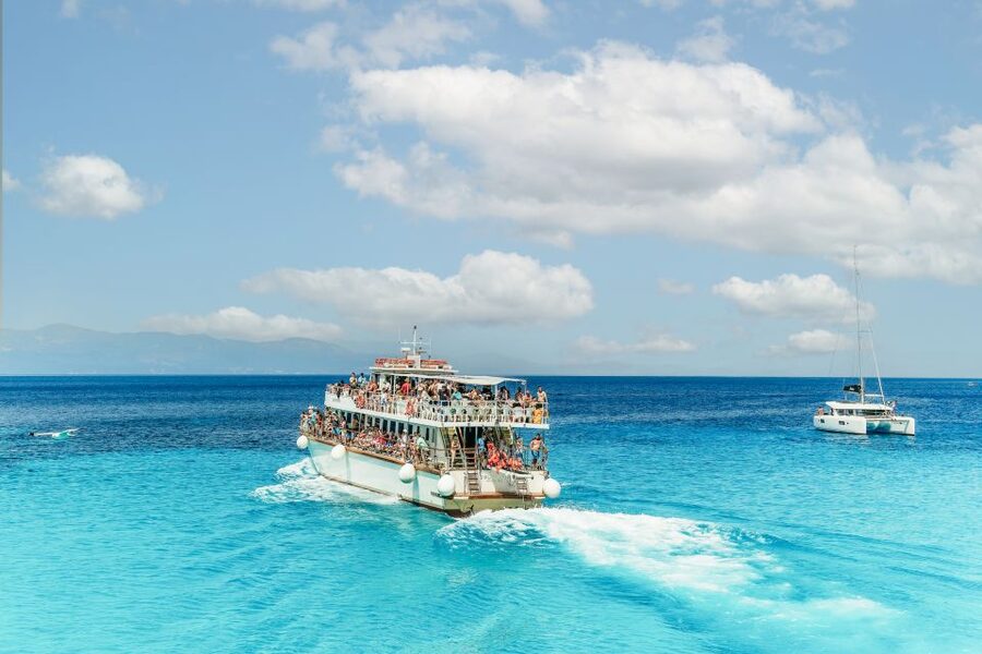 From Corfu Island: Antipaxos & Paxos Blue Caves Boat Cruise - The ride home: music, dancing, and a long crossing