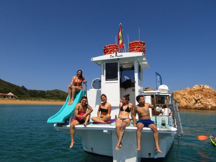 From Fornells: North Coast Beaches Cruise with Swim Stops - What the boat provides, and what costs extra