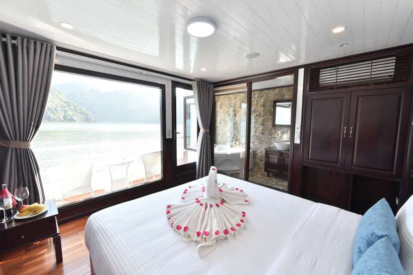 From Hanoi: 2-Day Halong Sapphire Cruise with Balcony Cabin - Afternoon on the bay: swimming, photos, and spring rolls