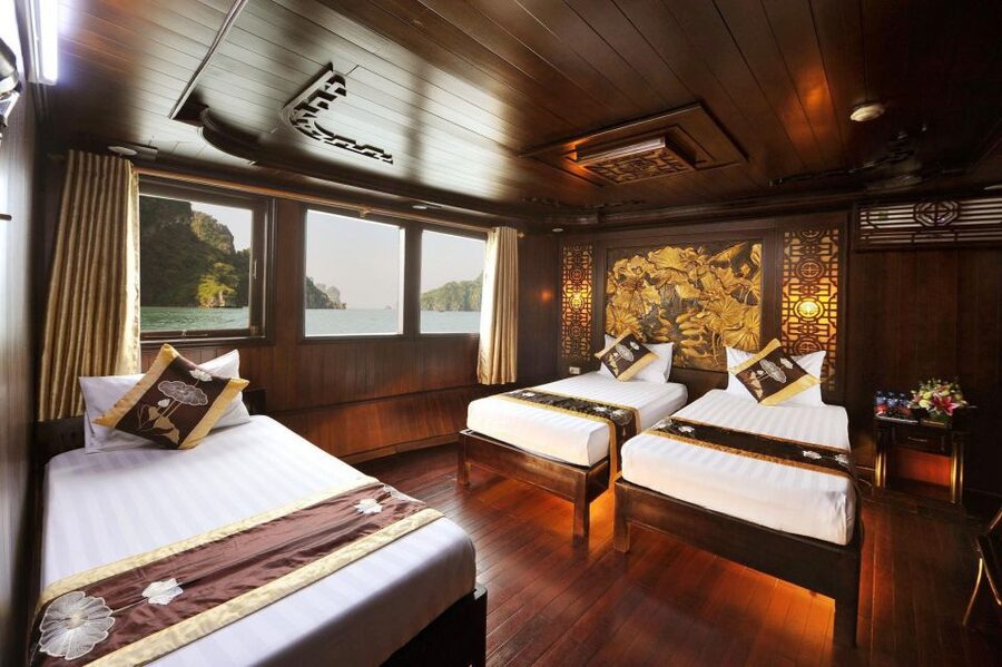 From Hanoi: Ha Long - Bai Tu Long Bay 2-Day 1-Night Cruise - Day two: Tai Chi, cave walls, and a beach stop